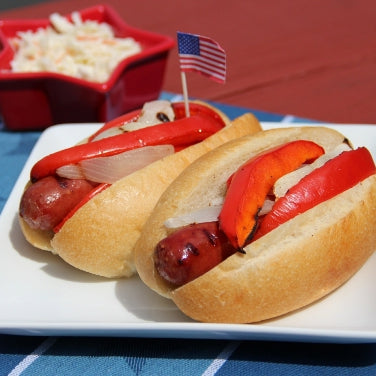 Grilled Bratwurst in Beer with Peppers and Onions