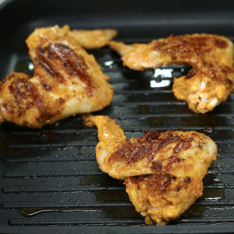 Spicy Chicken Wings Grilled Chicken Wings Marinated in a Ground Cumin, Coriander & Fennel Rub